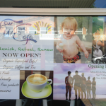 new wave cafe window sign